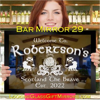 mirror design with scottish design held by girl from scotland